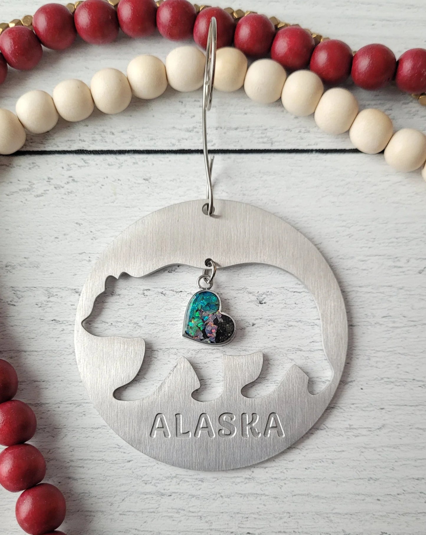 Here & There - Metal Ornament with Sand Charm