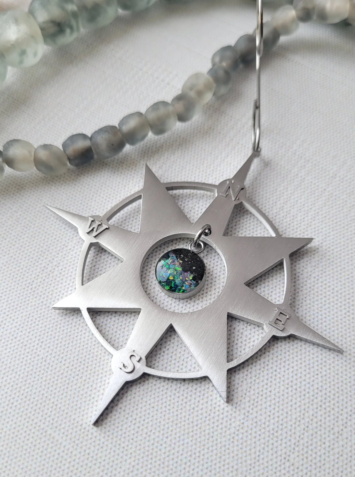 Here & There - Metal Ornament with Sand Charm
